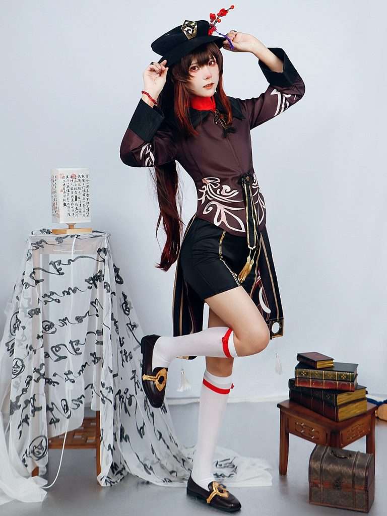 A model wearing the Hu Tao cosplay costume from Genshin Impact, showcasing the full outfit with accurate details. 