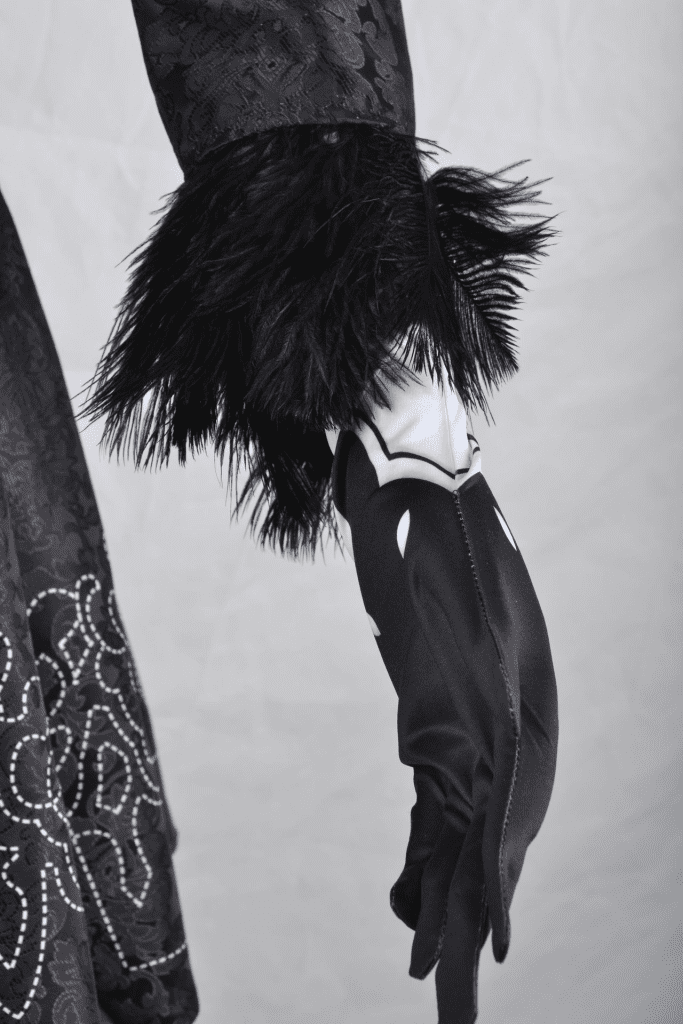 Close-up of the YoRHa No. 2 Type B cosplay costume showing fabric texture and embroidery. 