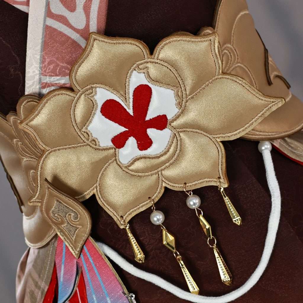 Close-up of Tingyun cosplay's accessories and fabric pattern