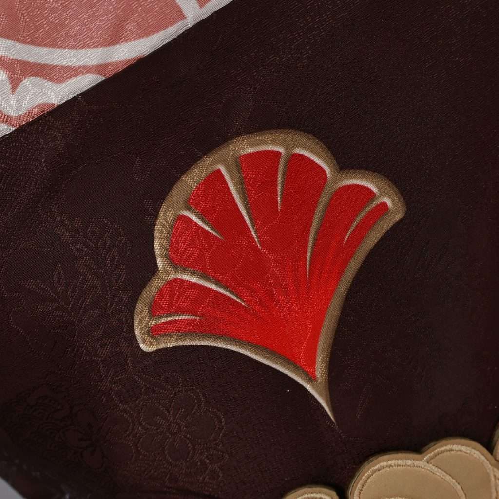 Close-up of Tingyun cosplay's accessories and fabric pattern