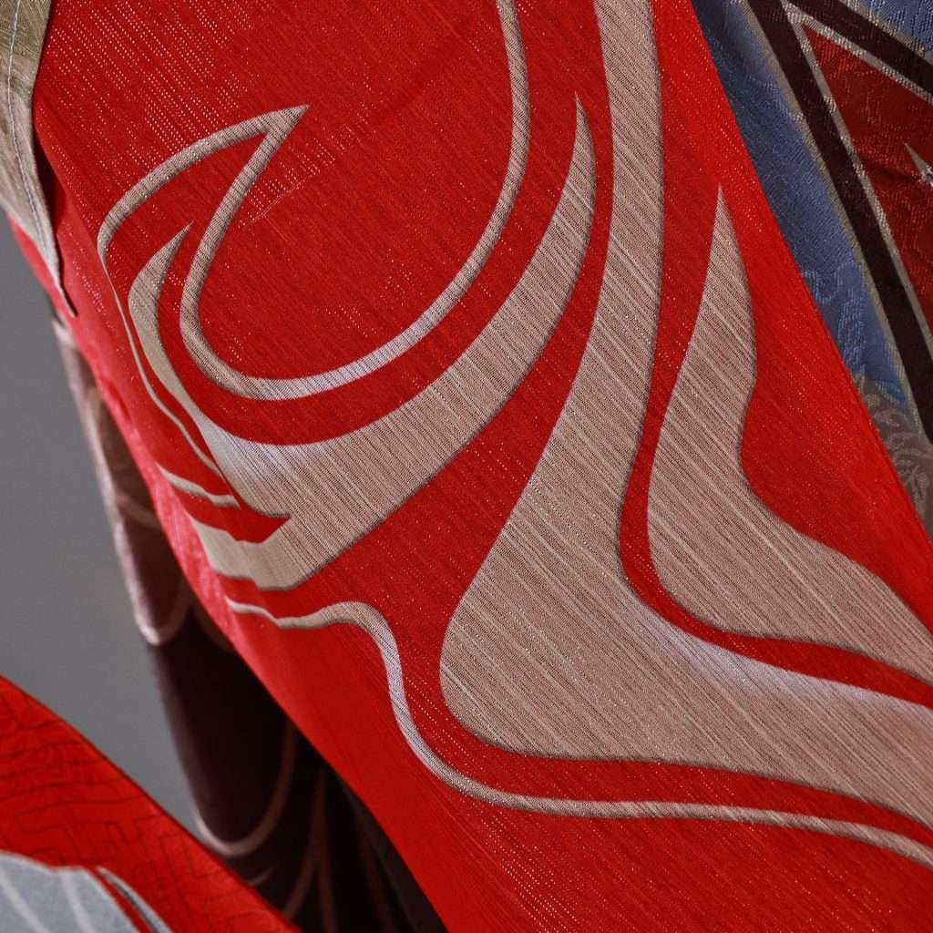 Close-up of Tingyun cosplay's accessories and fabric pattern