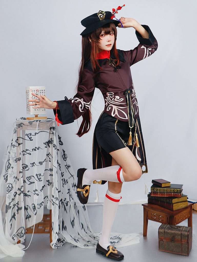 A model wearing the Hu Tao cosplay costume from Genshin Impact, showcasing the full outfit with accurate details. 