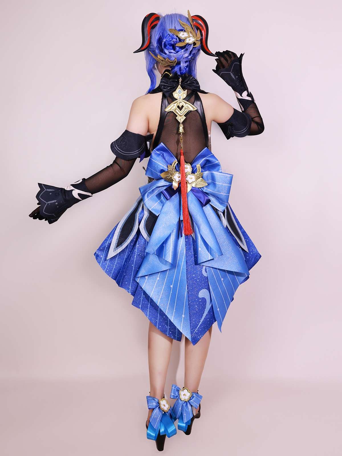 Back side of Ganyu cosplay costume showing tail and design lines