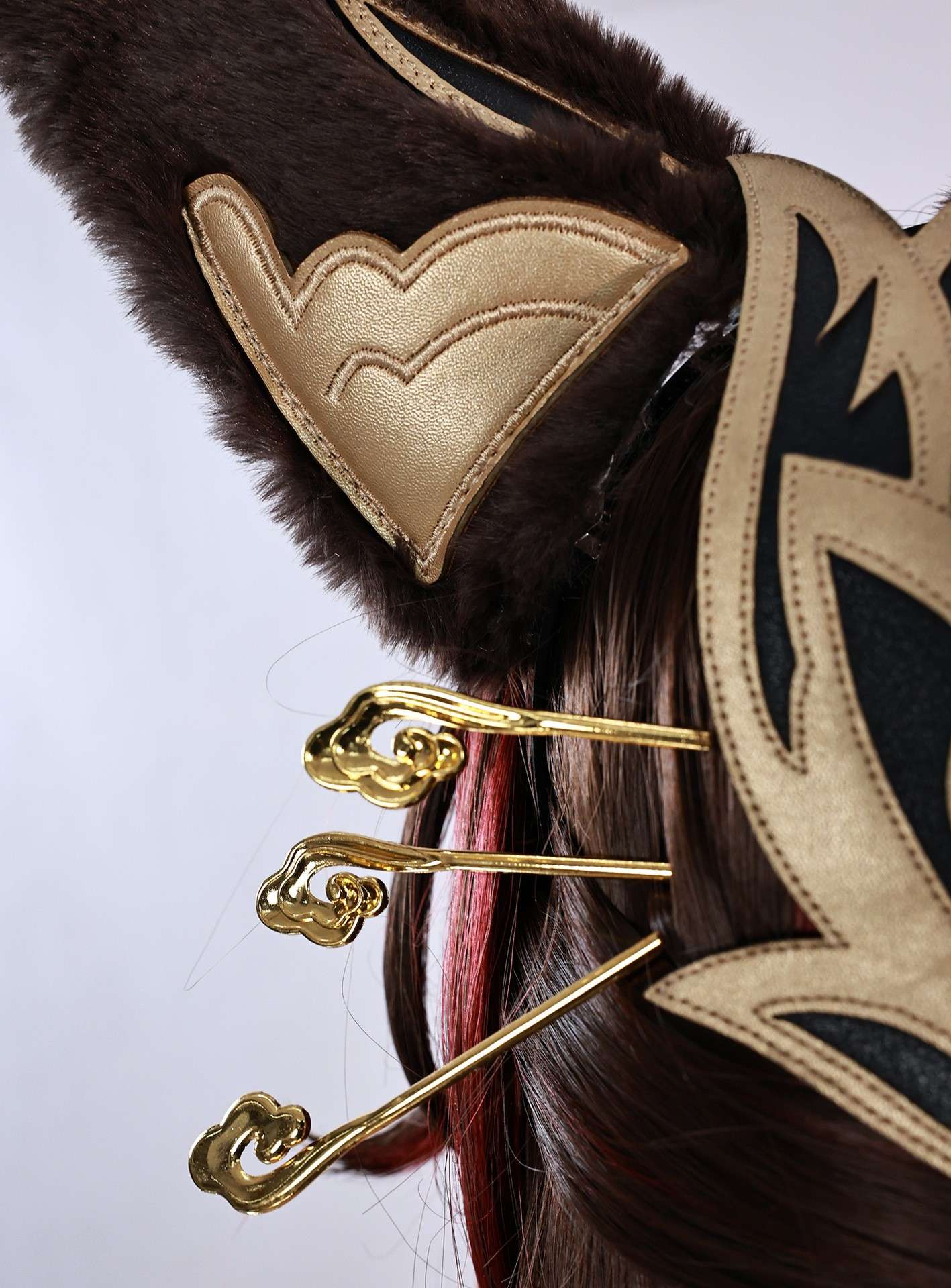 Close-up of Tingyun cosplay's accessories and fabric pattern