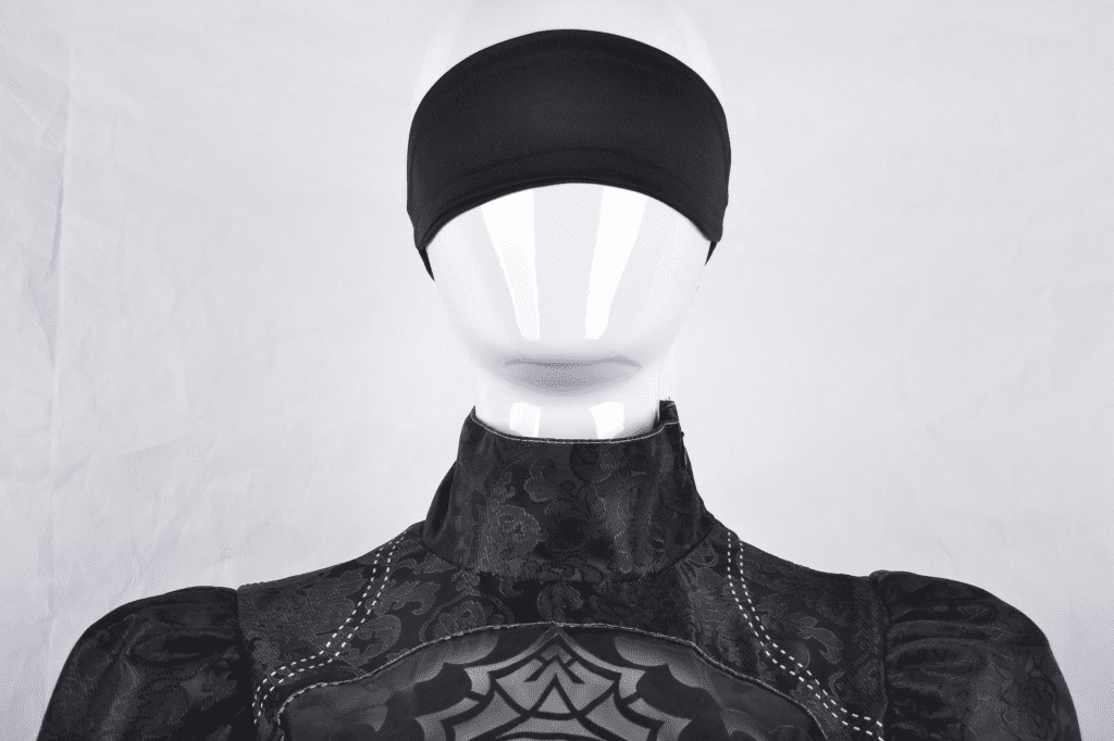 Close-up of the YoRHa No. 2 Type B cosplay costume showing fabric texture and embroidery. 