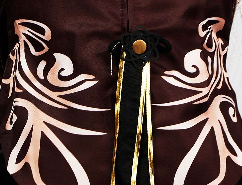 Close-up view of the embroidery and fabric details of the Hu Tao cosplay costume from Genshin Impact.