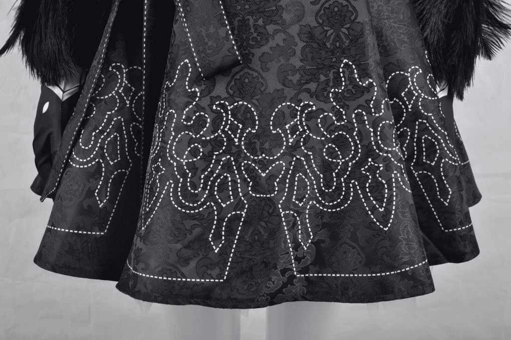 Close-up of the YoRHa No. 2 Type B cosplay costume showing fabric texture and embroidery. 