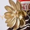 Close-up of Tingyun cosplay's accessories and fabric pattern