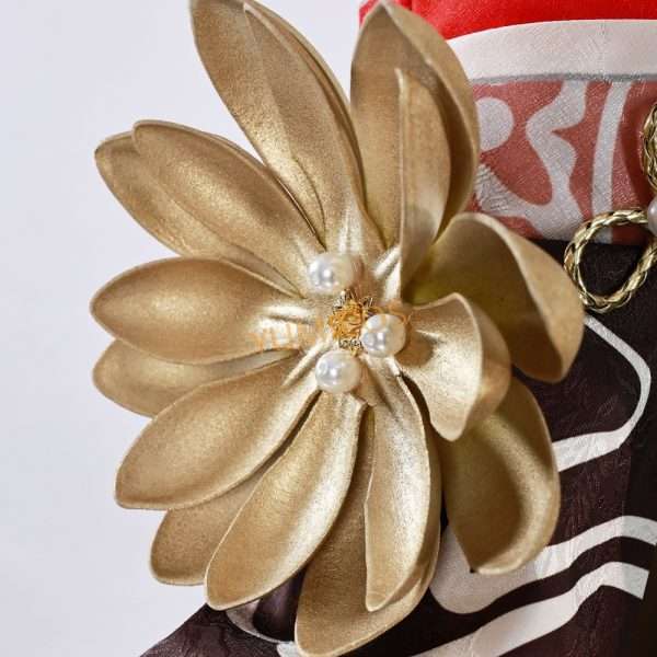 Close-up of Tingyun cosplay's accessories and fabric pattern