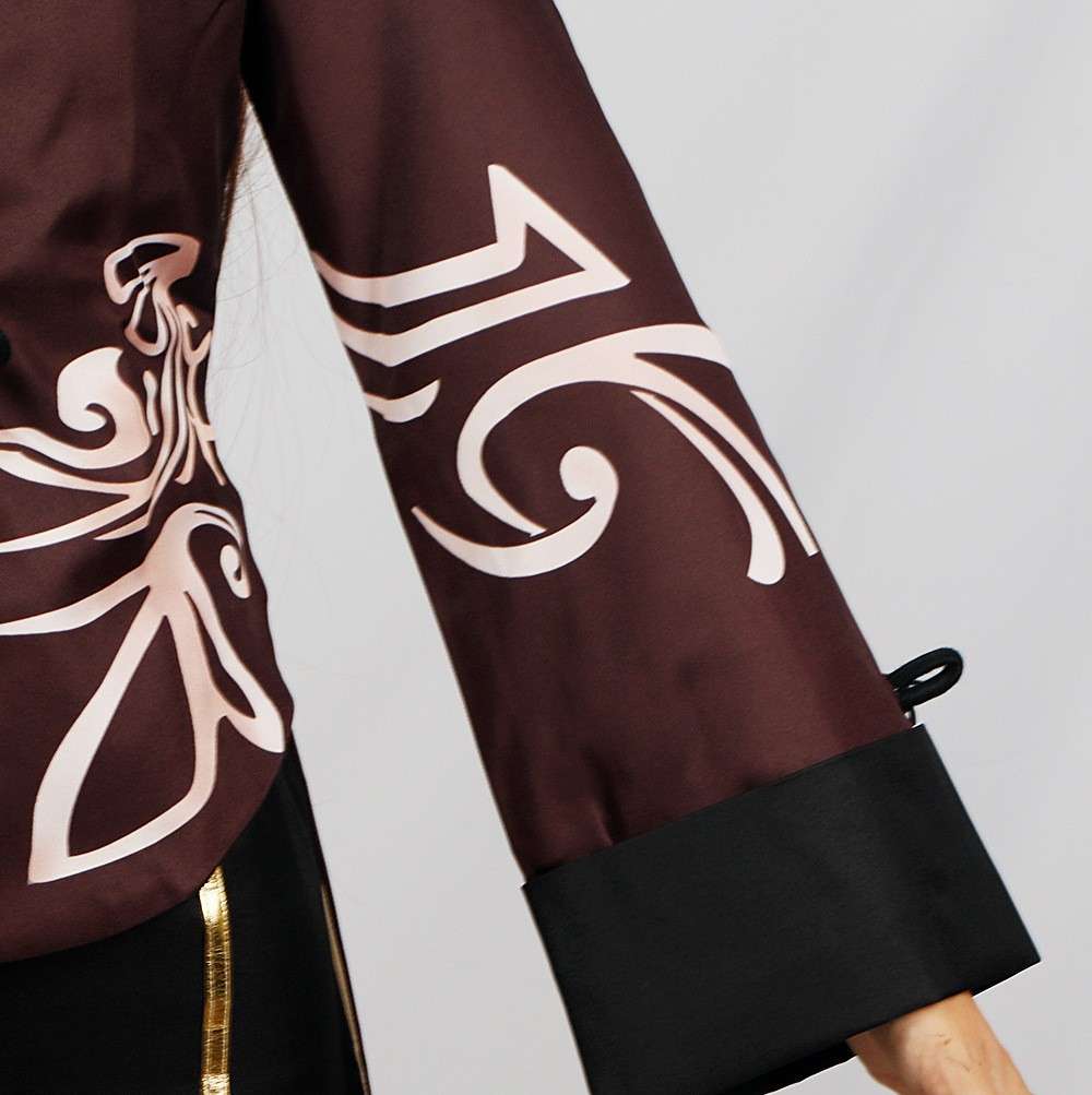 Close-up view of the embroidery and fabric details of the Hu Tao cosplay costume from Genshin Impact. 