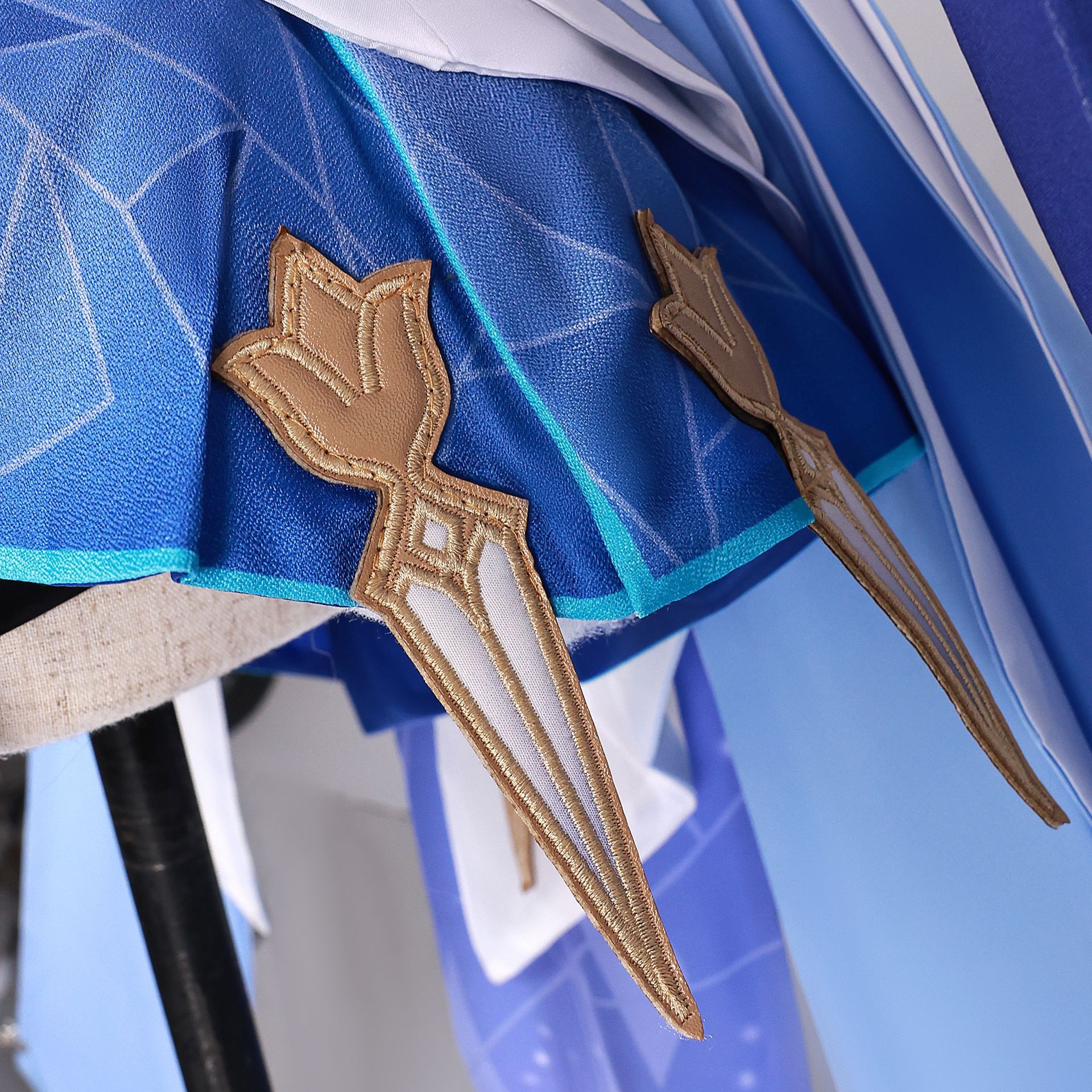 Close-up of Skirk cosplay embroidery and fabric